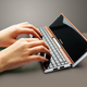 Illustration for article titled Shots Leak of Lenovo Pocket Yoga Netbook Concept, Looks Like it Actually Fits In a Pocket
